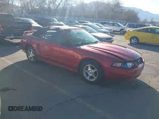 2003 Ford Mustang Deluxe z VIN 1FAFP44403F383522, wystawiony jako IAAI lot #41955227 z przebiegiem 166 713 mil mil oraz . Historia ofert i sprzedaży dostępna na DreamBid. Obrazek 1.