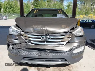 2014 Hyundai Santa Fe z VIN 5XYZUDLB0EG187192, wystawiony jako IAAI lot #42360255 z przebiegiem 154 607 mil mil oraz . Historia ofert i sprzedaży dostępna na DreamBid. Obrazek 12.