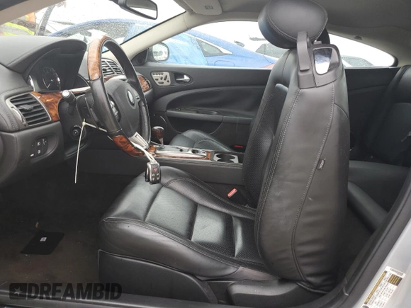 2007 Jaguar XK with VIN SAJWA43B475B12815, listed as a Copart auction lot 75012064 with 55,917 mi miles and Salvage Title. Bid and sale history available at carsss.com. Image 7.