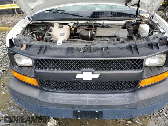 2013 Chevrolet Express Cargo z VIN 1GCSGAFX5D1164407, wystawiony jako Copart lot #56353205 z przebiegiem 166 202 mil mil oraz Szkoda całkowita • Salvage title. Historia ofert i sprzedaży dostępna na DreamBid. Obrazek 12.