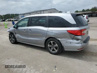 2018 Honda Odyssey Touring with VIN 5FNRL6H81JB078091, listed as a Copart auction lot 51372075 with 104,144 mi miles and Salvage Title. Bid and sale history available at carsss.com. Image 2.