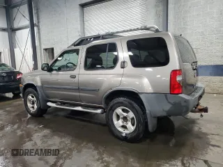 2004 Nissan Xterra XE with VIN 5N1ED28YX4C650888, listed as a Copart auction lot 57151695 with 142,210 mi miles and Salvage title. Bid and sale history available at DreamBid. Image 2.