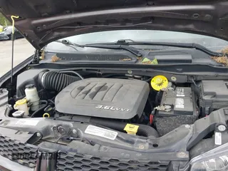 2015 Dodge Grand Caravan American Value with VIN 2C4RDGBG2FR542844, listed as a IAAI auction lot 42109983 with 129,718 mi miles and . Bid and sale history available at DreamBid. Image 10.