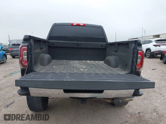 2017 GMC Sierra 1500 SLT z VIN 3GTU2NEC1HG385071, wystawiony jako IAAI lot #41877395 z przebiegiem 104 236 mil mil oraz . Historia ofert i sprzedaży dostępna na DreamBid. Obrazek 12.