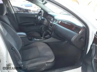 2014 Chevrolet Impala Limited LT with VIN 2G1WB5E36E1108163, listed as a IAAI auction lot 41494438 with NaN miles. Bid and sale history available at carsss.com. Image 5.