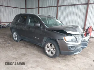 2016 Jeep Compass Latitude with VIN 1C4NJCEA2GD599833, listed as a IAAI auction lot 41507729 with 107,187 mi miles. Bid and sale history available at carsss.com. Image 1.