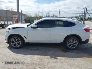 2021 BMW X4 xDrive30i with VIN 5UX2V1C03M9F12611, listed as a IAAI auction lot 42145740 with 60,417 mi miles and . Bid and sale history available at DreamBid. Image 14.