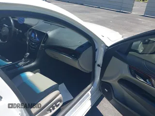 2016 Cadillac ATS Luxury Collection RWD z VIN 1G6AB5RX4G0133529, wystawiony jako IAAI lot #42314146 z przebiegiem 158 897 mil mil oraz . Historia ofert i sprzedaży dostępna na DreamBid. Obrazek 5.
