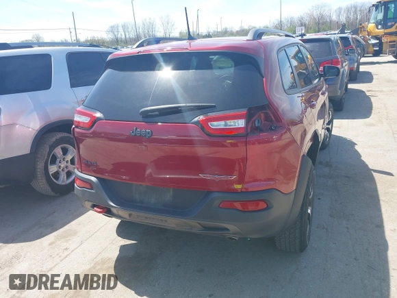 2016 Jeep Cherokee Trailhawk with VIN 1C4PJMBS9GW237059, listed as a IAAI auction lot 42079788 with 114,513 mi miles. Bid and sale history available at carsss.com. Image 17.