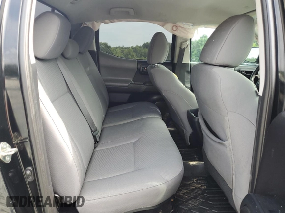 2020 Toyota Tacoma SR5 with VIN 3TMCZ5AN0LM299243, listed as a Copart auction lot 58818825 with 76,449 mi miles and Salvage title. Bid and sale history available at DreamBid. Image 10.