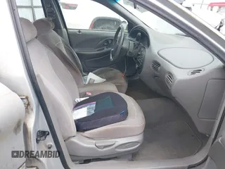 1997 Ford Taurus GL z VIN 1FALP52UXVG180596, wystawiony jako IAAI lot #42463461 z przebiegiem 190 419 mil mil oraz . Historia ofert i sprzedaży dostępna na DreamBid. Obrazek 5.