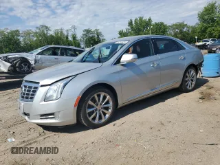 2014 Cadillac XTS Luxury with VIN 2G61N5S3XE9280049, listed as a Copart auction lot 56206805 with 114,583 mi miles and Salvage title. Bid and sale history available at DreamBid. Image 1.