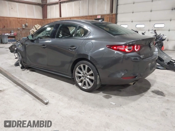 2020 Mazda 3 Premium with VIN 3MZBPBEM3LM123091, listed as a IAAI auction lot 41568213 with 68,515 mi miles and . Bid and sale history available at DreamBid. Image 3.