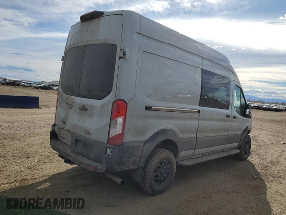 2023 Ford Transit Cargo with VIN 1FTBW2XG9PKB73049, listed as a Copart auction lot 50264605 with 103,021 mi miles and Salvage title. Bid and sale history available at DreamBid. Image 3.