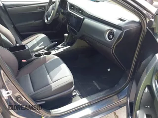 2018 Toyota Corolla L z VIN 5YFBURHE4JP820560, wystawiony jako IAAI lot #42317624 z przebiegiem 84 946 mil mil oraz . Historia ofert i sprzedaży dostępna na DreamBid. Obrazek 5.
