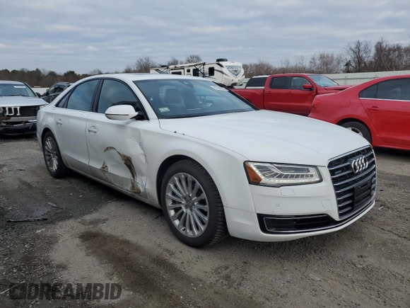 2015 Audi A8 z VIN WAUJGAFD9FN003570, wystawiony jako Copart lot #87642905 z przebiegiem 71 523 mil mil oraz Czysty tytuł • Clean title. Historia ofert i sprzedaży dostępna na DreamBid. Obrazek 4.