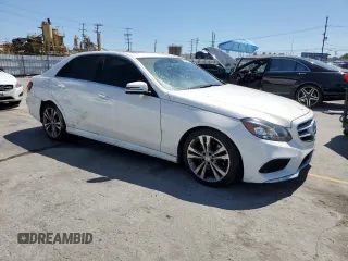 2014 Mercedes-Benz E 350 Sport with VIN WDDHF5KB0EA846889, listed as a Copart auction lot 56346475 with 110,930 mi miles and Salvage title. Bid and sale history available at DreamBid. Image 4.