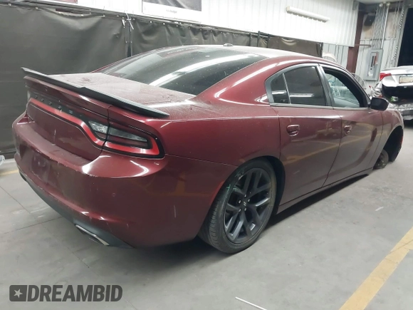 2020 Dodge Charger SXT with VIN 2C3CDXBG4LH101261, listed as a IAAI auction lot 42045103 with 114,349 mi miles. Bid and sale history available at carsss.com. Image 4.