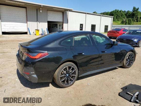 2022 BMW i4 eDrive40 with VIN WBY73AW05NFM59840, listed as a Copart auction lot 55608094 with 25,720 mi miles and Salvage Title. Bid and sale history available at carsss.com. Image 3.
