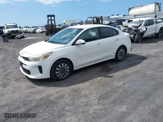 2019 Kia Rio S with VIN 3KPA24AB9KE214579, listed as a IAAI auction lot 41764485 with 82,231 mi miles. Bid and sale history available at carsss.com. Image 18.