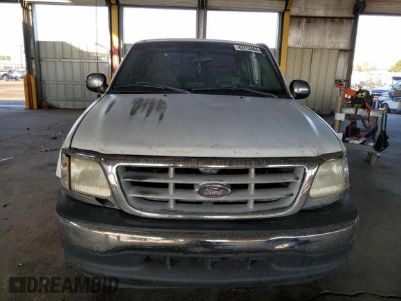 2000 Ford F-150 XL with VIN 1FTRX17W1YNB88948, listed as a Copart auction lot 83114404 with 288,100 mi miles and Salvage Title. Bid and sale history available at carsss.com. Image 5.