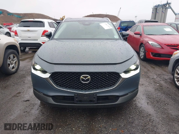 2024 Mazda CX-30 S Carbon Edition z VIN 3MVDMBCM7RM606050, wystawiony jako IAAI lot #41807459 z przebiegiem 7908 mil mil oraz . Historia ofert i sprzedaży dostępna na DreamBid. Obrazek 12.