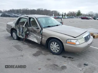 2004 Mercury Grand Marquis LS Premium z VIN 2MEFM75W14X643516, wystawiony jako IAAI lot #42007171 z przebiegiem 213 531 mil mil oraz . Historia ofert i sprzedaży dostępna na DreamBid. Obrazek 1.