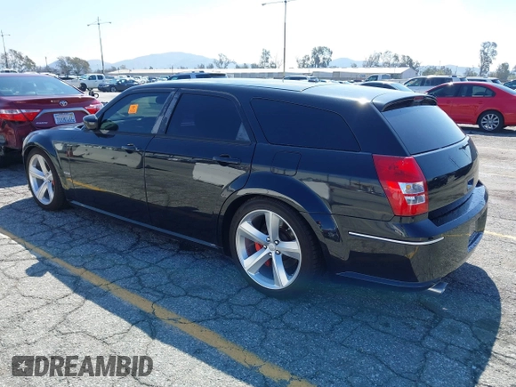 2007 Dodge Magnum SRT-8 with VIN 2D4GV773X7H654618, listed as a IAAI auction lot 41752289 with 103,819 mi miles and . Bid and sale history available at carsss.com. Image 3.