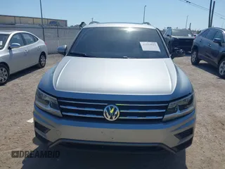 2020 Volkswagen Tiguan SE with VIN 3VV3B7AX8LM077472, listed as a IAAI auction lot 41933521 with 52,028 mi miles and . Bid and sale history available at DreamBid. Image 12.