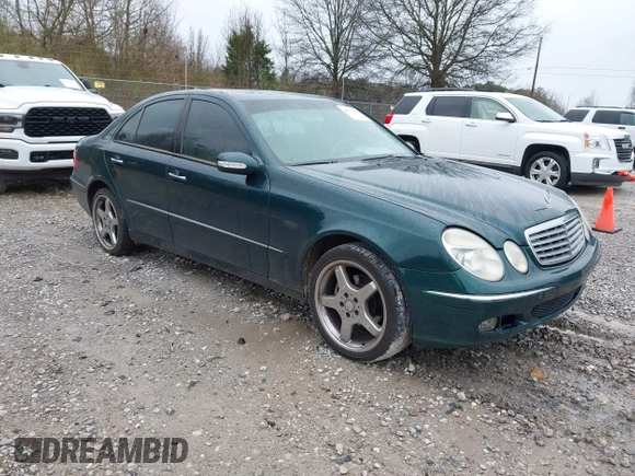 2003 Mercedes-Benz E-Class 3.2L with VIN WDBUF65J73A130214, listed as a IAAI auction lot 41731642 with 203,520 mi miles. Bid and sale history available at carsss.com. Image 1.