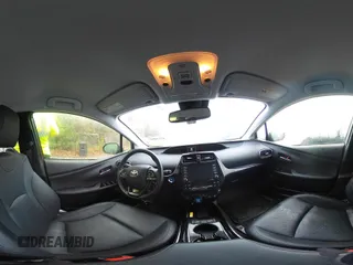 2021 Toyota Prius LE z VIN JTDL9MFU5M3023704, wystawiony jako IAAI lot #42190887 z przebiegiem 45 711 mil mil oraz . Historia ofert i sprzedaży dostępna na DreamBid. Obrazek 19.