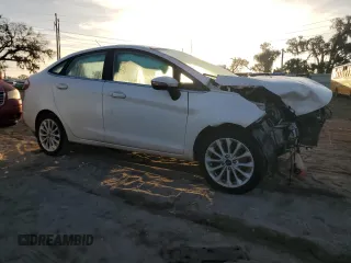 2017 Ford Fiesta Titanium with VIN 3FADP4CJ1HM123863, listed as a Copart auction lot 80270774 with 66,911 mi miles and Salvage Title. Bid and sale history available at DreamBid. Image 4.