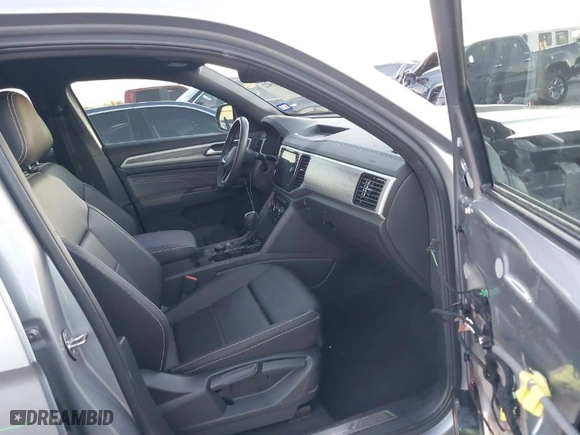 2023 Volkswagen Atlas Cross Sport 3.6L V6 SE w/Technology with VIN 1V2KE2CA8PC223209, listed as a IAAI auction lot 41251422 with 33,921 mi miles. Bid and sale history available at carsss.com. Image 5.