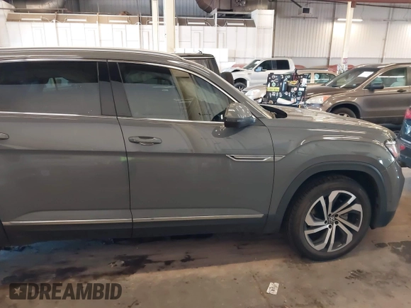 2021 Volkswagen Atlas SEL Premium with VIN 1V2TE2CA8MC207933, listed as a IAAI auction lot 41823640 with 64,425 mi miles and . Bid and sale history available at DreamBid. Image 13.
