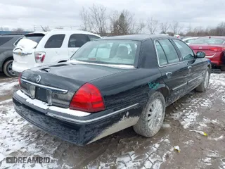 2010 Mercury Grand Marquis LS with VIN 2MEBM7FV5AX631935, listed as a IAAI auction lot 41726717 with 124,139 mi miles. Bid and sale history available at carsss.com. Image 4.