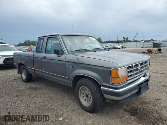 1991 Ford Ranger STX with VIN 1FTCR14X7MPA03412, listed as a Copart auction lot 63078515 with 32,891 mi miles and Salvage title. Bid and sale history available at DreamBid. Image 4.