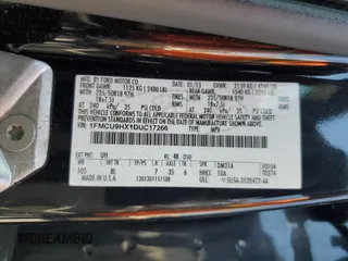 2013 Ford Escape SEL z VIN 1FMCU9HX1DUC17266, wystawiony jako Copart lot #63678025 z przebiegiem 196 206 mil mil oraz Szkoda całkowita • Salvage title. Historia ofert i sprzedaży dostępna na DreamBid. Obrazek 14.