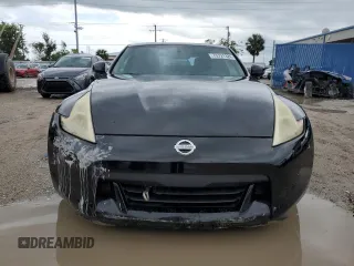2009 Nissan 370Z Touring with VIN JN1AZ44E29M406023, listed as a Copart auction lot 73721324 with 108,072 mi miles and Salvage Title. Bid and sale history available at carsss.com. Image 5.