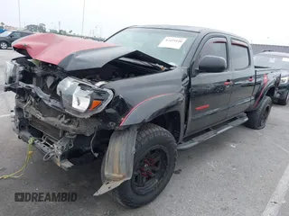 2013 Toyota Tacoma PreRunner with VIN 5TFKU4HN9DX003190, listed as a IAAI auction lot 42429140 with 299,678 mi miles and . Bid and sale history available at DreamBid. Image 2.