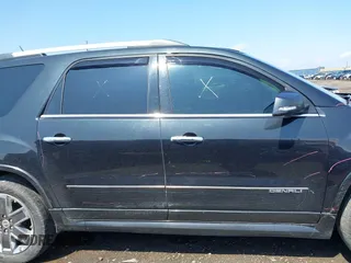 2011 GMC Acadia Denali z VIN 1GKKVTED3BJ406413, wystawiony jako IAAI lot #42180753 z przebiegiem 183 521 mil mil oraz . Historia ofert i sprzedaży dostępna na DreamBid. Obrazek 13.