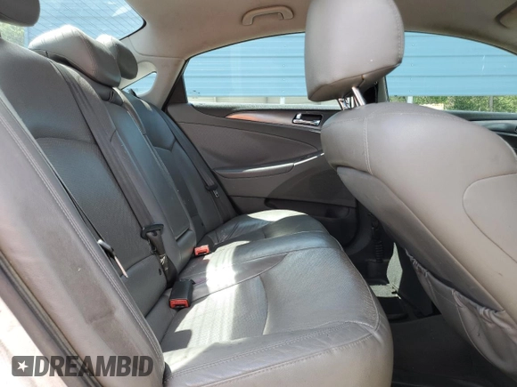 2012 Hyundai Sonata Hybrid z VIN KMHEC4A43CA059186, wystawiony jako Copart lot #55575405 z przebiegiem 217 801 mil mil oraz Szkoda całkowita • Salvage title. Historia ofert i sprzedaży dostępna na DreamBid. Obrazek 10.