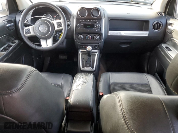 2014 Jeep Compass High Altitude with VIN 1C4NJCEA9ED678722, listed as a Copart auction lot 86573694 with 234,985 mi miles and Clean Title. Bid and sale history available at carsss.com. Image 8.