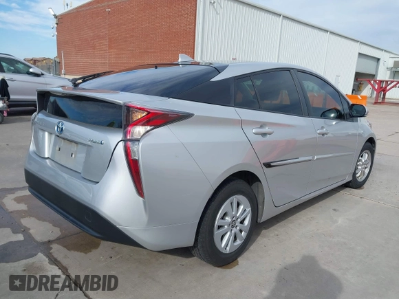 2016 Toyota Prius Two with VIN JTDKBRFU9G3010519, listed as a IAAI auction lot 41455426 with 82,029 mi miles. Bid and sale history available at carsss.com. Image 4.