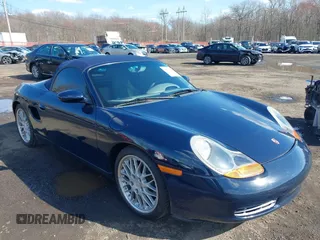 2001 Porsche Boxster z VIN WP0CA29861S620159, wystawiony jako IAAI lot #41868701 z przebiegiem 38 776 mil mil oraz . Historia ofert i sprzedaży dostępna na DreamBid. Obrazek 17.