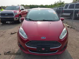 2015 Ford Fiesta Titanium z VIN 3FADP4FJ1FM171680, wystawiony jako IAAI lot #42383105 z przebiegiem 51 396 mil mil oraz . Historia ofert i sprzedaży dostępna na DreamBid. Obrazek 12.