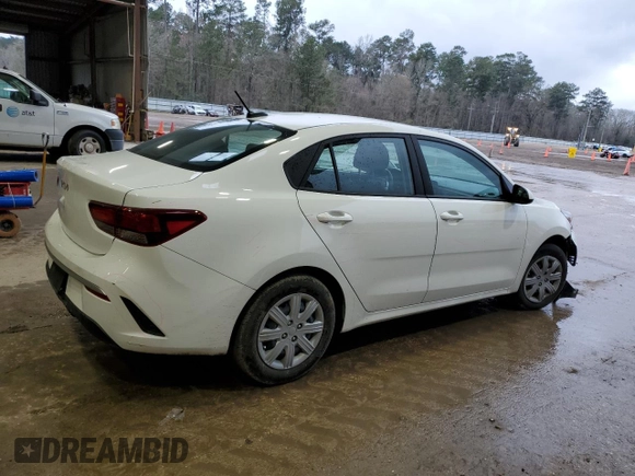 2023 Kia Rio LX with VIN 3KPA24ADXPE615843, listed as a Copart auction lot 47660125 with 27,841 mi miles and Salvage Title. Bid and sale history available at DreamBid. Image 3.