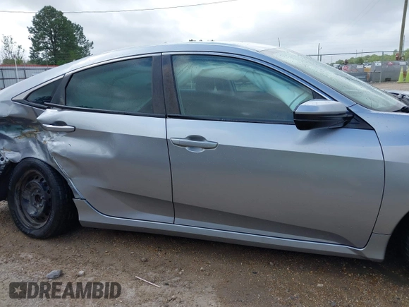 2019 Honda Civic LX with VIN 19XFC2F60KE043806, listed as a IAAI auction lot 41915894 with 123,141 mi miles and . Bid and sale history available at DreamBid. Image 14.