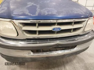 1997 Ford F-150 with VIN 1FTDF1767VKC52713, listed as a IAAI auction lot 42212161 with 136,306 mi miles and . Bid and sale history available at DreamBid. Image 13.