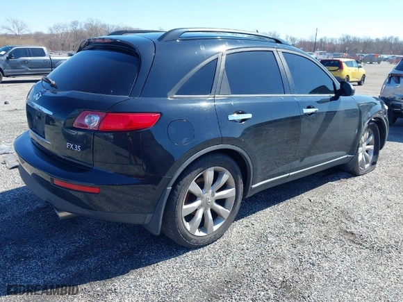 2003 Infiniti FX35 w/Options with VIN JNRAS08WX3X200869, listed as a IAAI auction lot 41853075 with 143,604 mi miles. Bid and sale history available at carsss.com. Image 4.