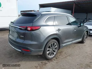 2016 Mazda CX-9 Signature with VIN JM3TCBEY7G0112486, listed as a IAAI auction lot 41592723 with 91,392 mi miles. Bid and sale history available at carsss.com. Image 4.